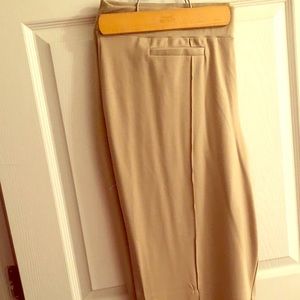 Pull on banded dress pant. Pleated